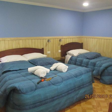 Patagonia Swiss House Hotel Puerto Natales Bagian luar foto