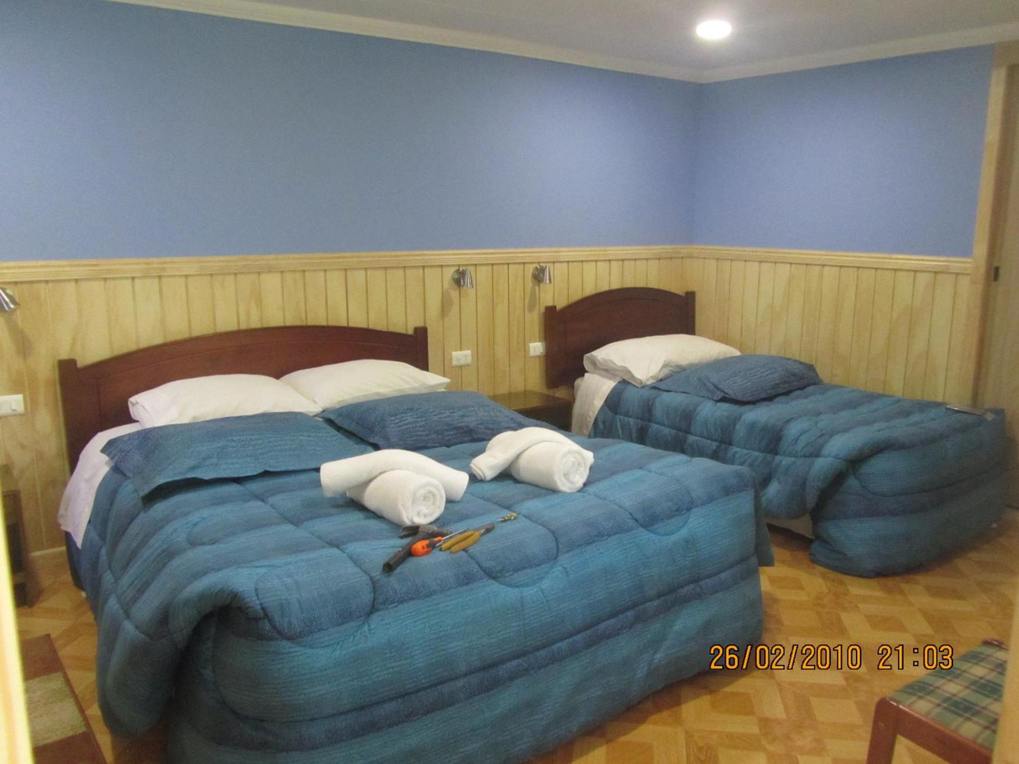Patagonia Swiss House Hotel Puerto Natales Bagian luar foto