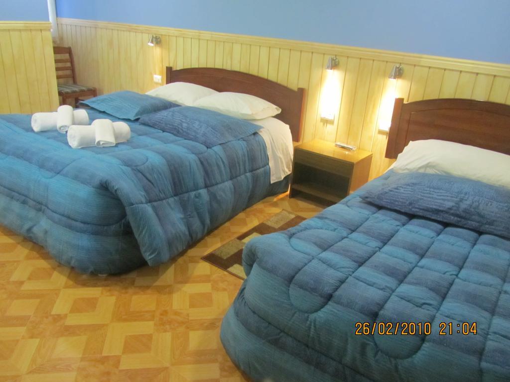 Patagonia Swiss House Hotel Puerto Natales Bagian luar foto