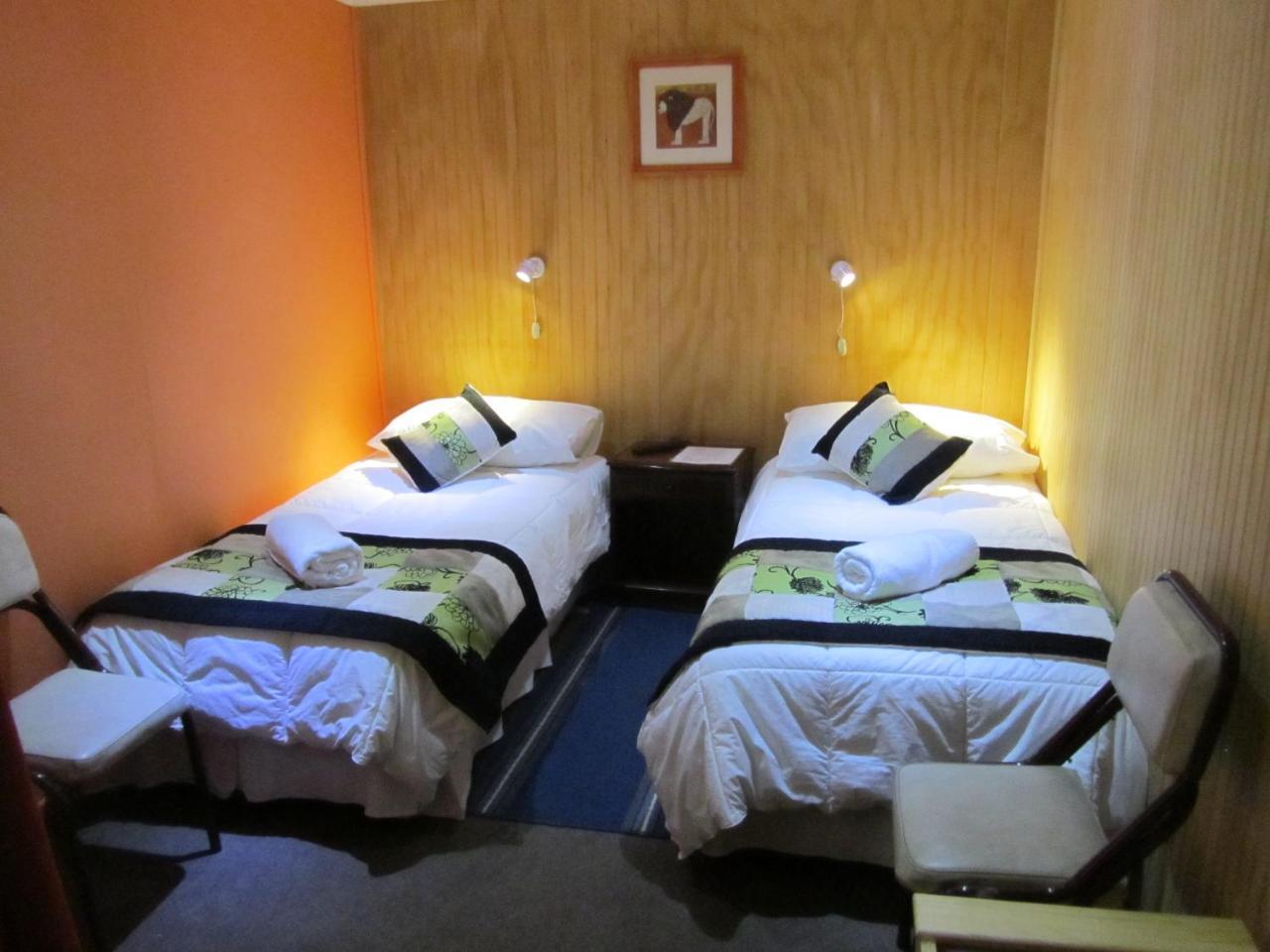 Patagonia Swiss House Hotel Puerto Natales Bagian luar foto
